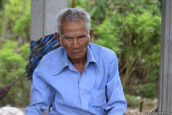 Duch Thuon, 66, a villager in Taches commune, said he registered as a CPP member after being approached by local officials and feeling he had no choice, Wednesday, November 8, 2017.